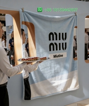 Miumiu Throw Blankets
